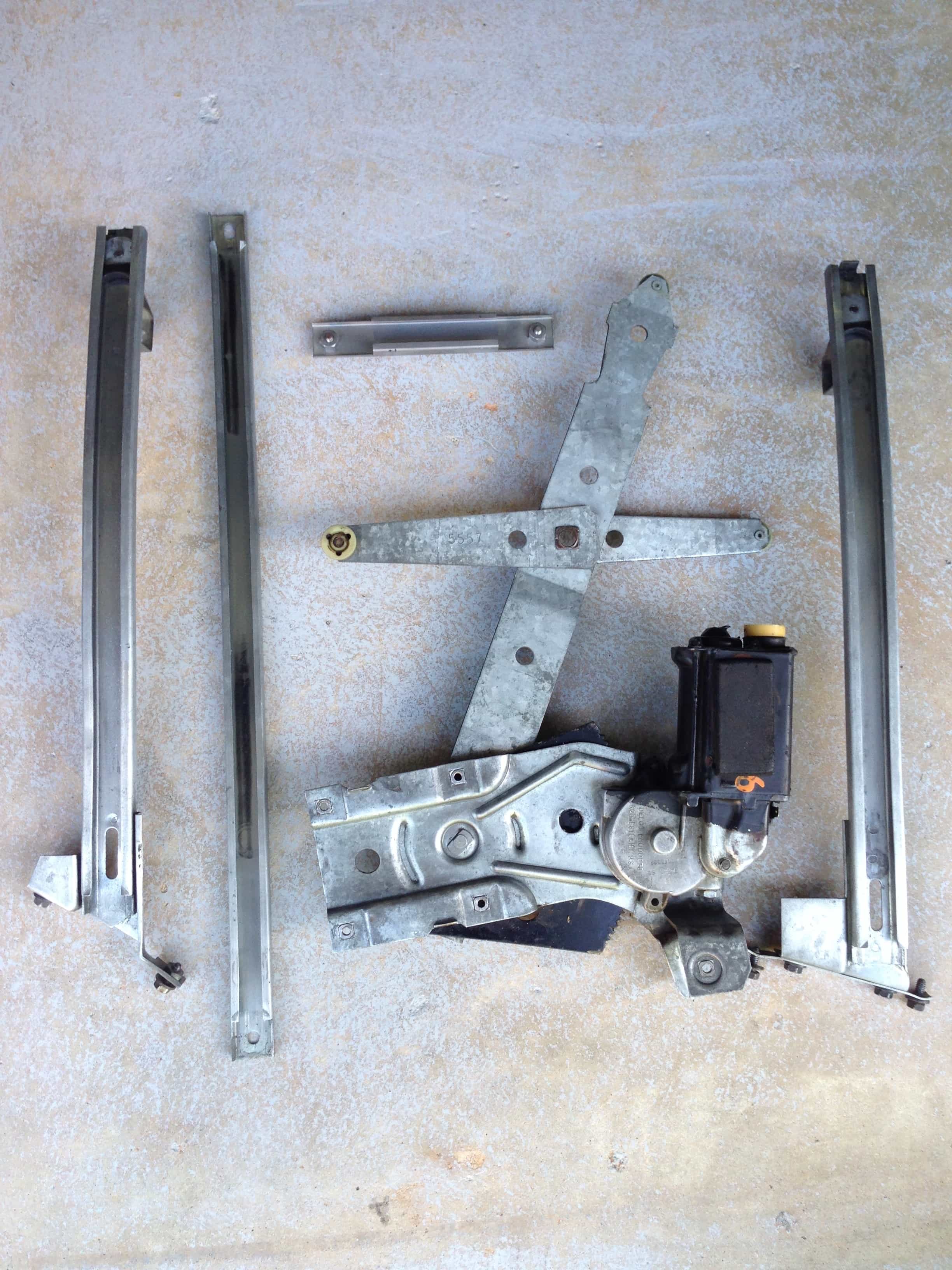 Pass window rails & motor after