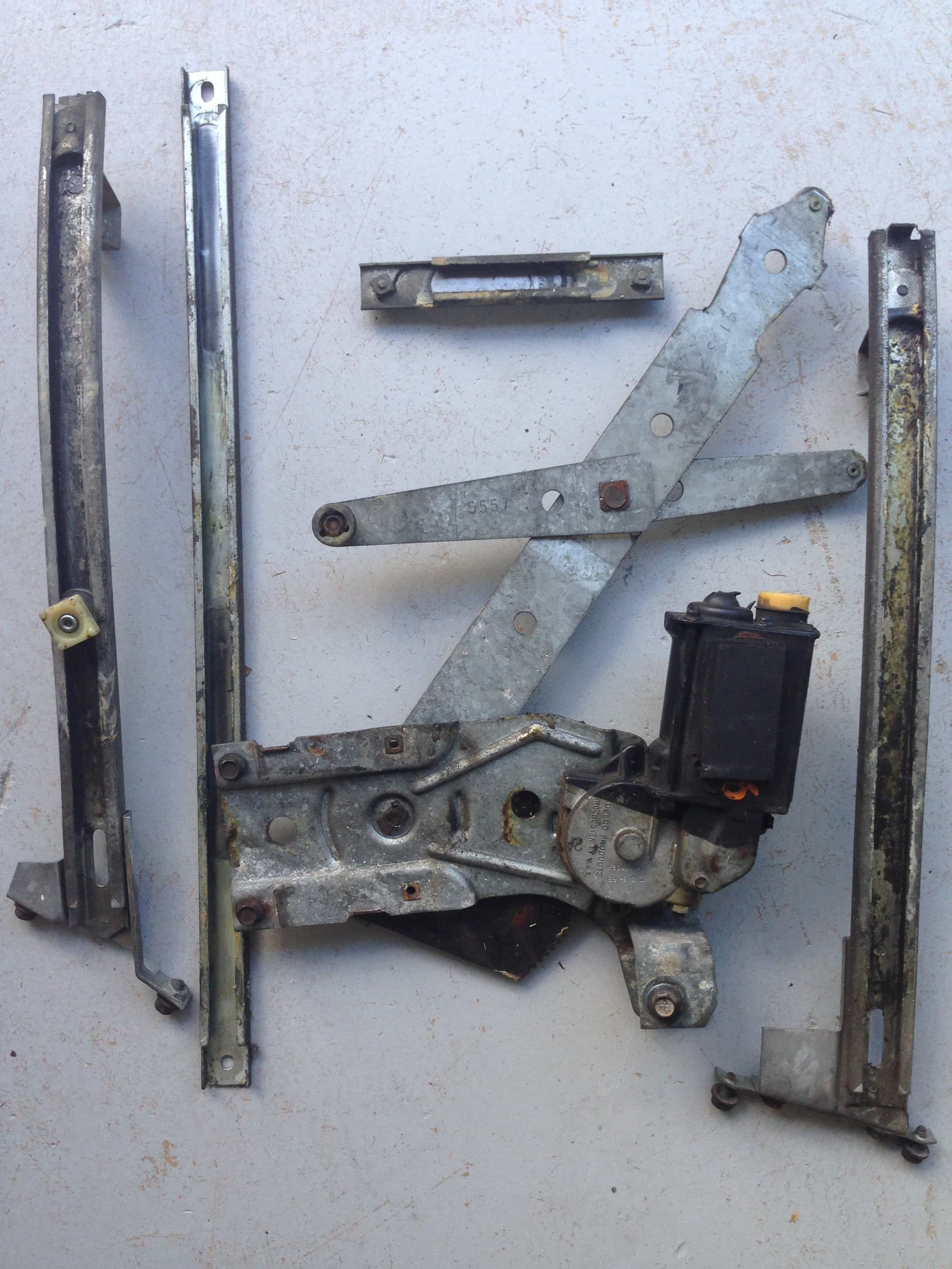 Pass window rails & motor before
